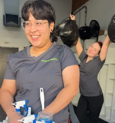 merry maids loading a vehicle